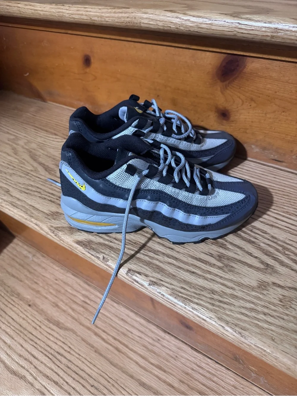 Nike Kids Black and Gray Sneakers with Yellow Logo